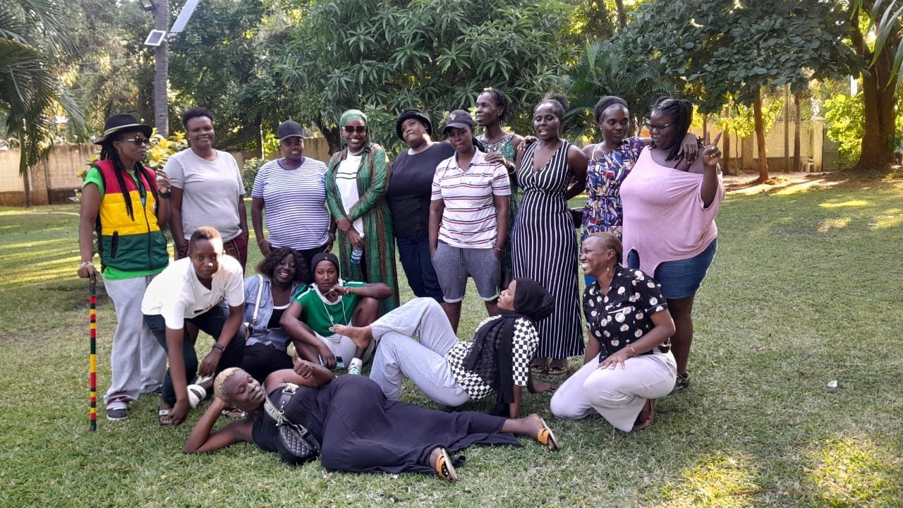 Members of Coast Women for Women gathered outdoors for a group photo